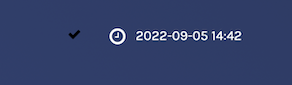 The black tickmark icon that indicates completion next to the date and time in the navbar.